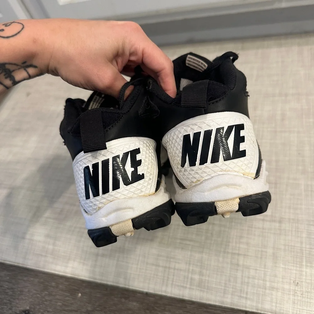 Nike Speed Shark 3/4 Football cleats in black and white.